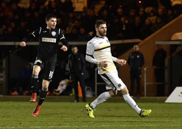 St Mirren's Lewis Morgan strikes to score his side's fifth goal. Picture: SNS