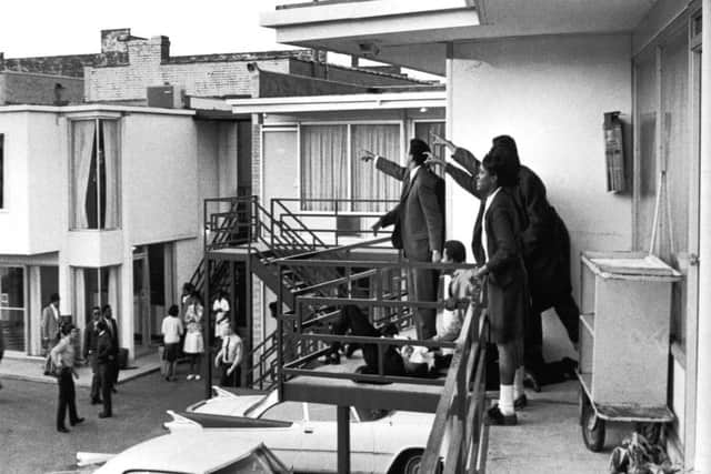 Dr Ralph Abernathy and Jesse Jackson (both obscured) and others stand on the balcony of the Lorraine motel after hearing the shot that killed King on 4 April, 1968. Picture: Joseph Louw/The LIFE Images Collection/Getty