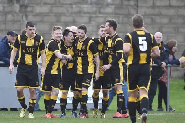 Auchinleck Talbot celebrate a goal in a Junior Cup tie. The Bot have won the trophy 11 times. Picture: Greg Macvean