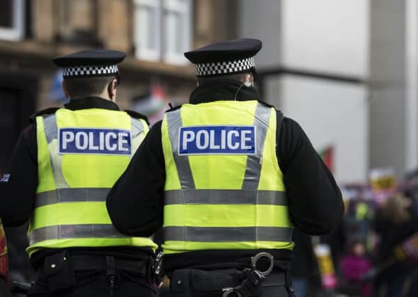 The Scottish Police Authority plans to cut the number of police officers in Scotland. Pic: John Devlin