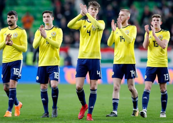 Jack Hendry, centre, impressed on his Scotland debut against Hungary. Picture: Getty