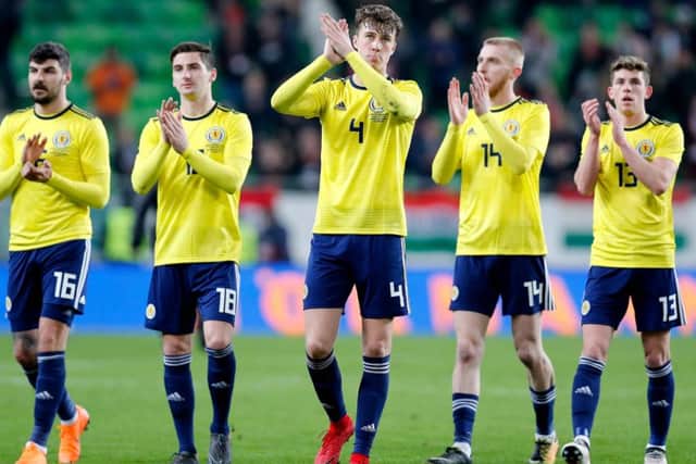 Jack Hendry, centre, impressed on his Scotland debut against Hungary. Picture: Getty