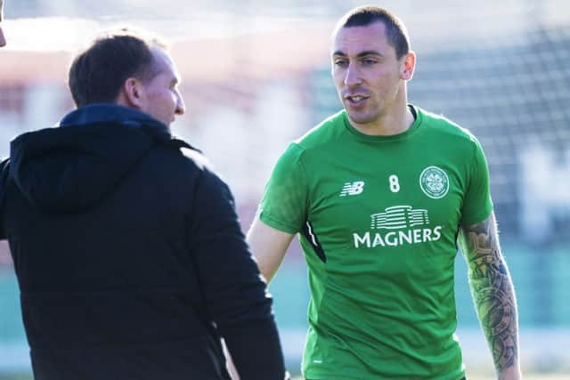 Scott Brown with Celtic manager Brendan Rodgers. Picture: SNS Group