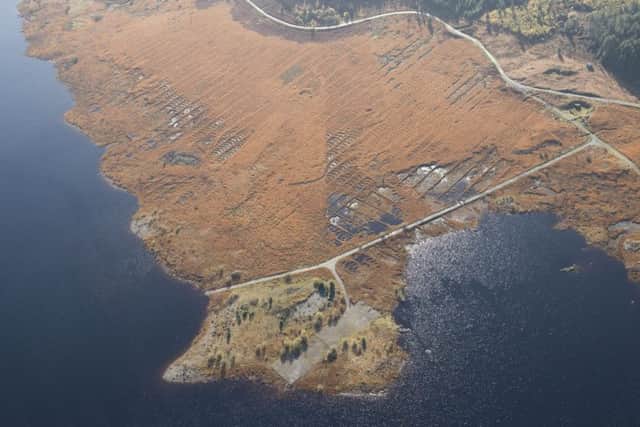 Remains of the partially constructed Loch Doon airfield, showing the concrete base of an airplane hanger. PIC: RCAHMS Aerial Photography Digital.