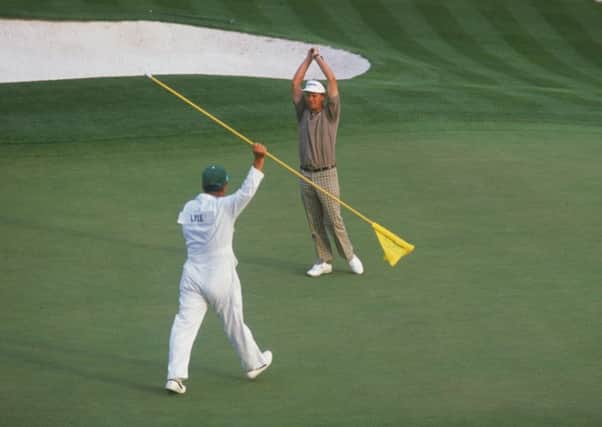 Sandy Lyle celebrates his Masters-winning putt on the 18th green at Augusta National in 1988. Picture: Getty Images