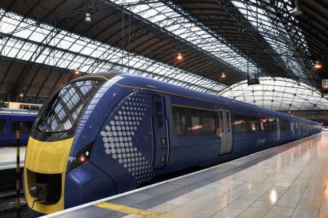 Hitachi electric trains should have started running on the Edinburgh-Glasgow line last September. Pic: PA Wire