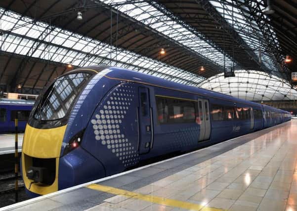 Hitachi electric trains should have started running on the Edinburgh-Glasgow line last September. Pic: PA Wire