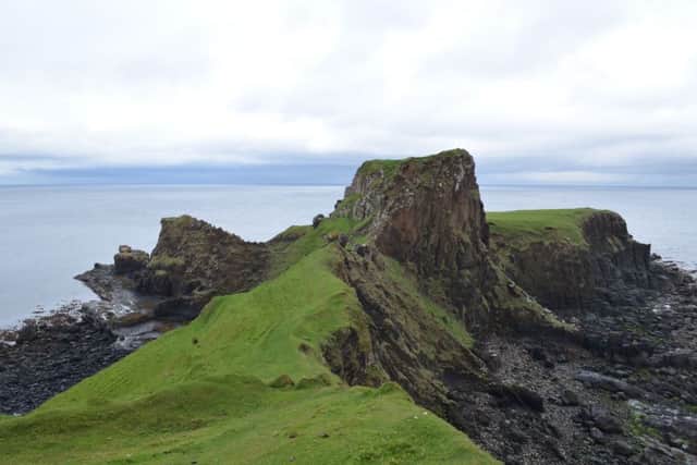 Researchers found about 50 giant dinosaur footprints at Brothers Point on Skyes Trotternish peninsula