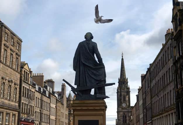 The ideas of economist Adam Smith, whose statue is given pride of place on Edinburgh's Royal Mile, helped shape the modern world (Picture: Phil Wilkinson)