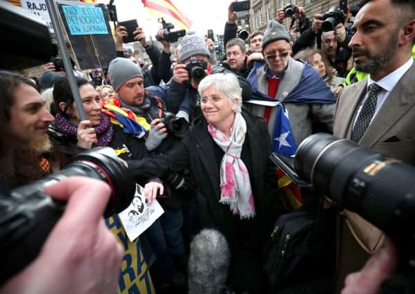 Former education minister Clara Ponsati greets supporters outside Edinburgh Sheriff Court after she was released on bail last Wednesday. Picture: 
Jane Barlow