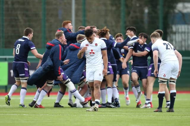 Scotland players celebrate the win over England at the U18s Six Nations Festival in Wales. Picture: Gareth Everett/Huw Evans/REX/Shutterstock