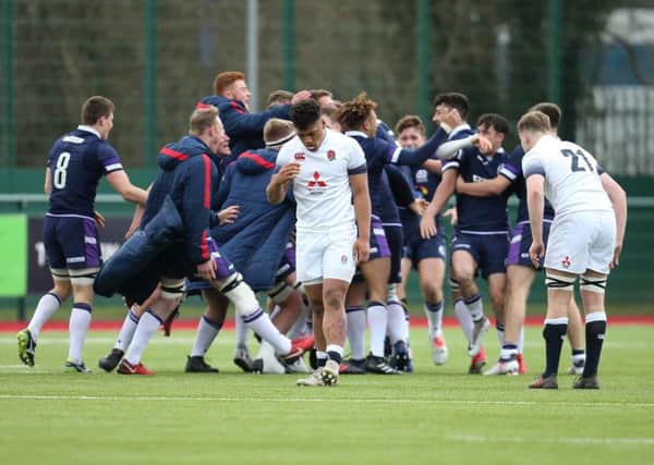 Scotland players celebrate the win over England at the U18s Six Nations Festival in Wales. Picture: Gareth Everett/Huw Evans/REX/Shutterstock