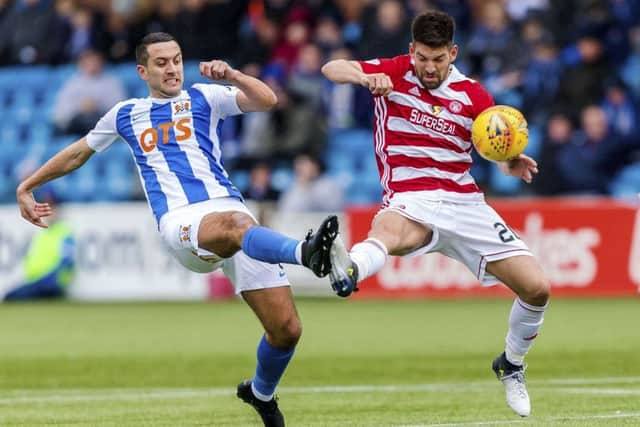 Kilmarnock's Gary Dicker (L) in action against Hamilton's Antonio Rojano. Picture: SNS/Roddy Scott