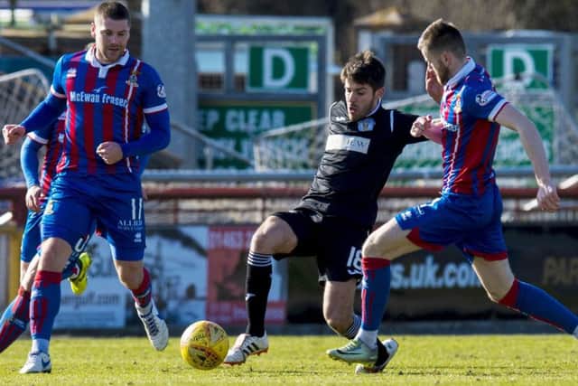 St Mirren's Ryan Flynn is closed down by Inverness' Iain Vigurs and Liam Polworth. Picture: SNS/Sammy Turner