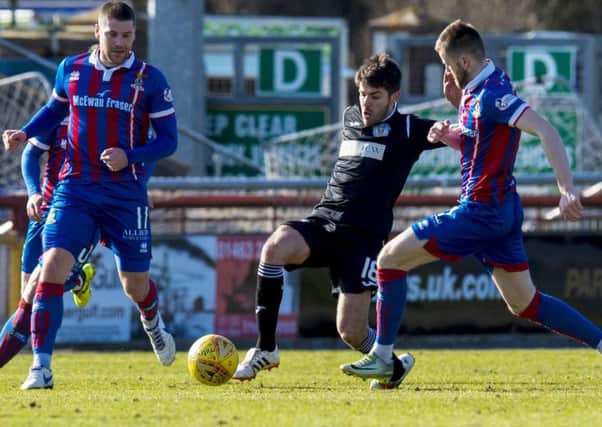 St Mirren's Ryan Flynn is closed down by Inverness' Iain Vigurs and Liam Polworth. Picture: SNS/Sammy Turner