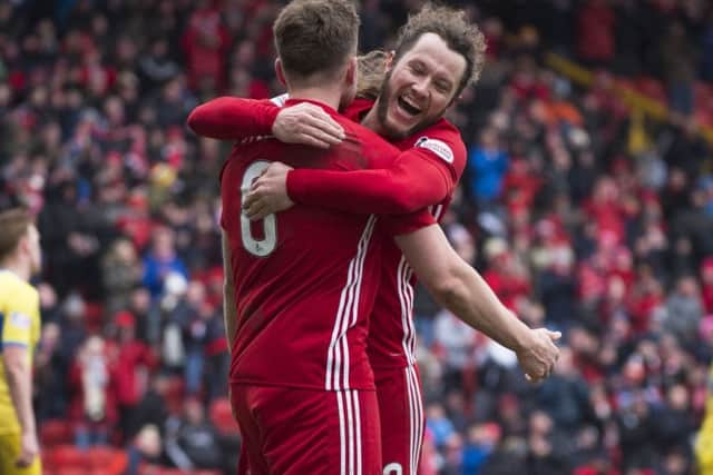 Stevie May celebrates Greg Stewart's second goal of the game. Picture: SNS