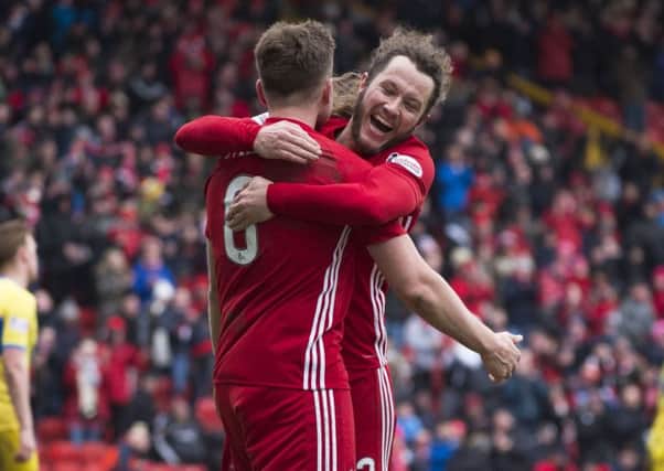 Stevie May celebrates Greg Stewart's second goal of the game. Picture: SNS