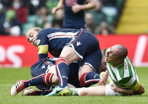 Andrew Davies appears to stamp his boot in Scott Brown's groin. Picture: SNS