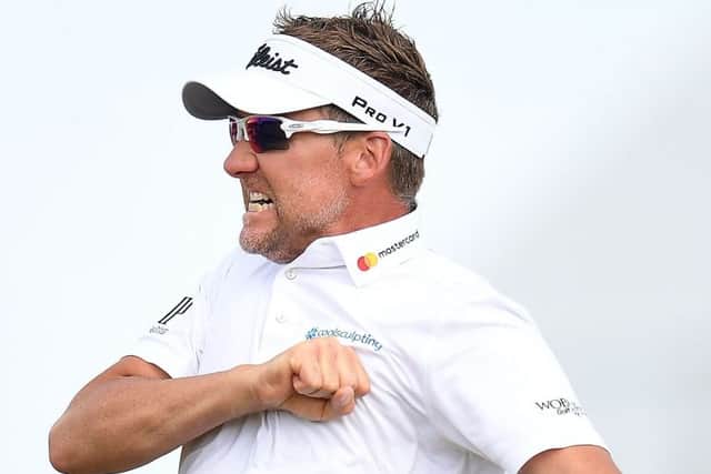 Ian Poulter thumps his chest in delight after victory in the Houston Open.