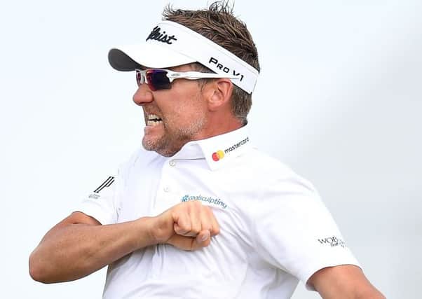 Ian Poulter thumps his chest in delight after victory in the Houston Open.