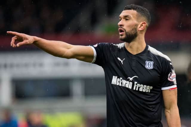 Steven Caulker in action for Dundee. Picture: SNS