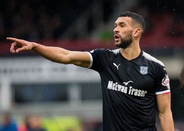 Steven Caulker in action for Dundee. Picture: SNS