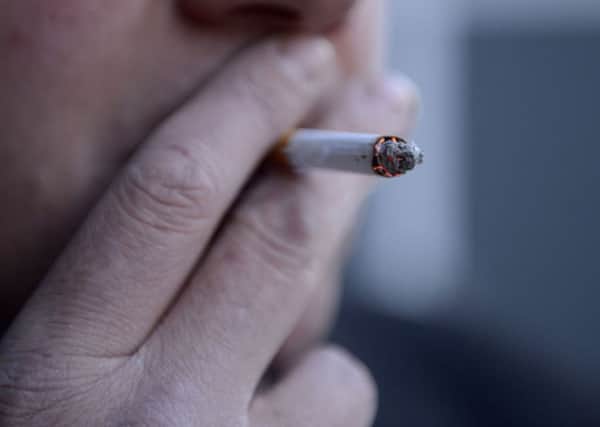 The number of Scots trying to quit smoking has fallen to a record low.