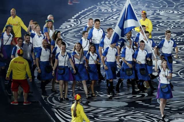 Team Scotland flag bearer Eilidh Doyle. (AP Photo/Mark Schiefelbein)