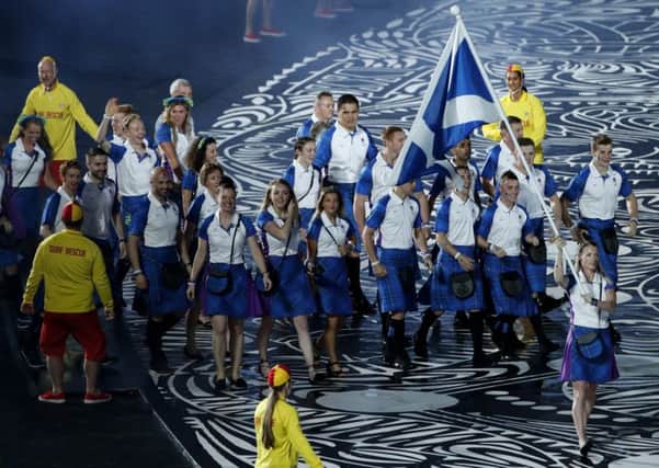Team Scotland flag bearer Eilidh Doyle. (AP Photo/Mark Schiefelbein)