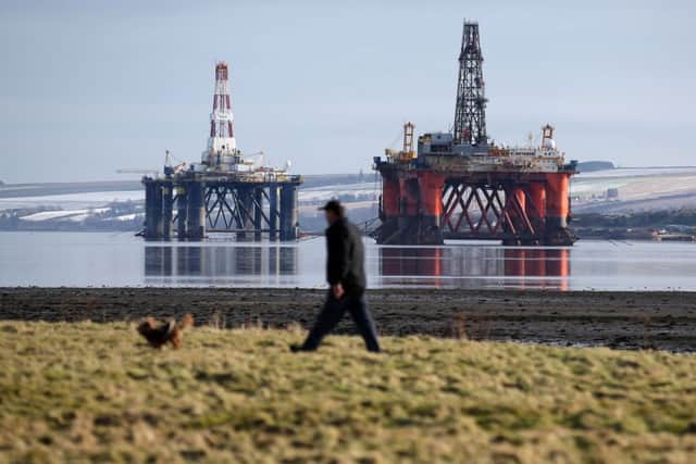 Oil platforms stand among other rigs laid-up in the Cromarty Firth near Invergordon. Picture: Andrew Milligan/PA Wire