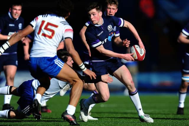 Scotland U18 try-scorer Rufus McLean offloads in the win over France at Cardiff Arms Park.  Picture: Harry Trump/Getty Images