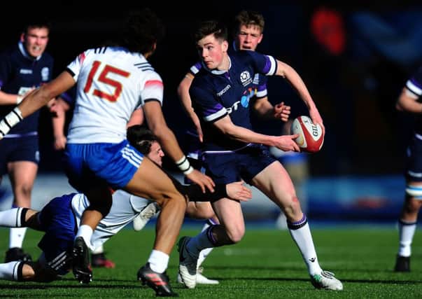 Scotland U18 try-scorer Rufus McLean offloads in the win over France at Cardiff Arms Park.  Picture: Harry Trump/Getty Images