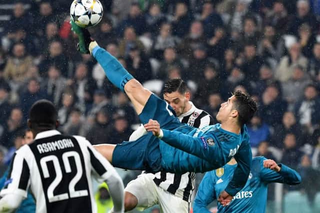 Cristiano Ronaldo scores with a brilliant overhead kick for Real Madrid against Juventus. Picture: Alberto Pizzoli/AFP/Getty Images