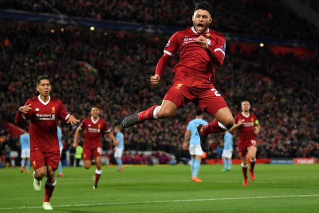 Alex Oxlade-Chamberlain celebrates after scoring Liverpool's second goal against Manchester City at Anfield. Picture: Shaun Botterill/Getty Images