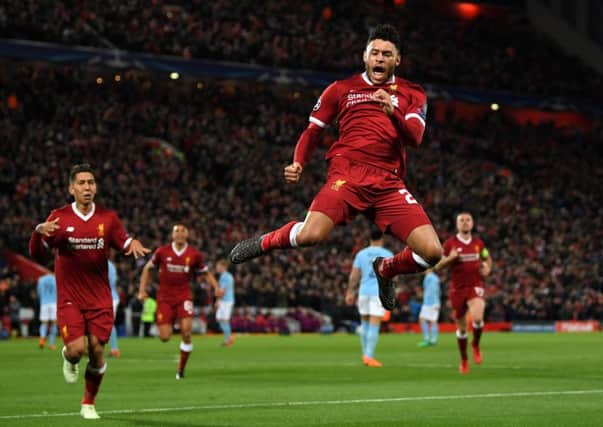 Alex Oxlade-Chamberlain celebrates after scoring Liverpool's second goal against Manchester City at Anfield. Picture: Shaun Botterill/Getty Images