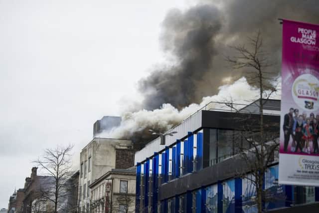 The huge blaze engulfed a block of buildings on Glasgow's busiest shopping streets. Pic: John Devlin