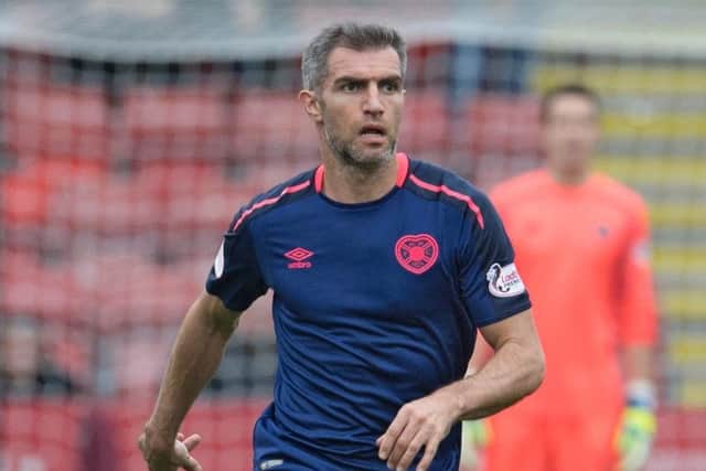 Aaron Hughes' current contract expires at the end of the season. Picture: SNS