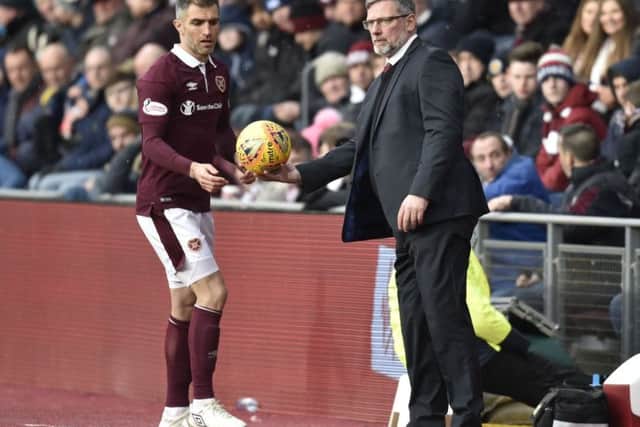 He's 38 and hasn't played much this season but Aaron Hughes is having a huge influence off the pitch, according to
Hearts manager Craig Levein. Picture: Rob Casey/SNS