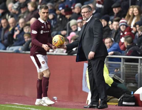 He's 38 and hasn't played much this season but Aaron Hughes is having a huge influence off the pitch, according to 
Hearts manager Craig Levein. Picture: Rob Casey/SNS