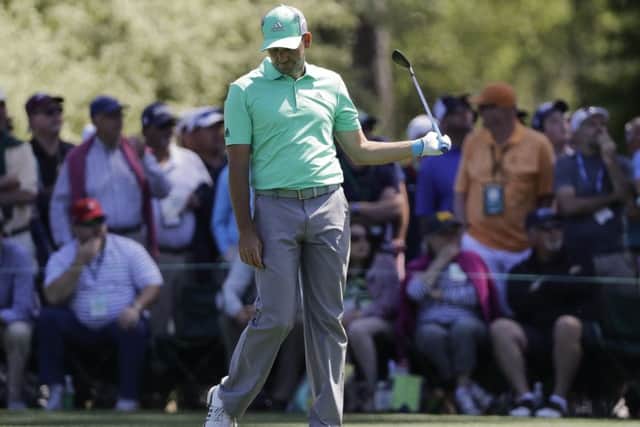 Sergio Garcia can't believe what's unfolding on the 15th hole as he loses five balls in the water and shoots 13. Picture: AP