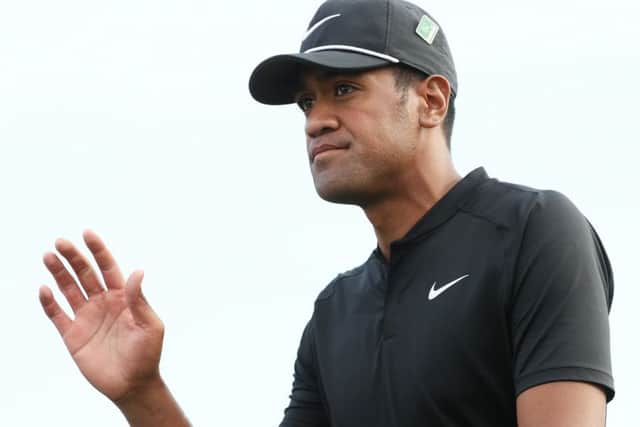American Tony Finau wves to the crowd during the first round at Augusta National. Picture: Getty Images