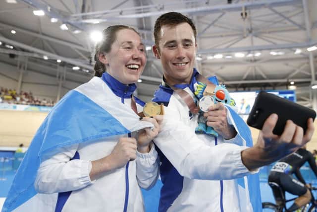 Scotland's Katie Archibald takes a selfie with her gold medal in the Women's 3000m Individual Pursuit Final alongside John Archibald with his silver medal in the Men's 4000m Individual Pursuit Finals. PICTURE: PA