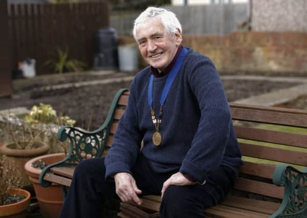 Jim Alder at his home in Ellington, Northumberland, with his 1966 Commonwealth Games marathon gold medal round his neck.
Picture: John Millard.