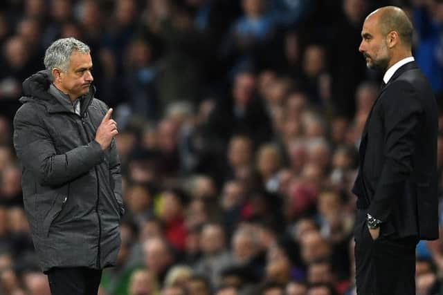 Jose Mourinho, left, will bid to delay Pep Guardiola's title party when they meet in the Manchester derby at the Etihad Stadium. Picture: Getty Images