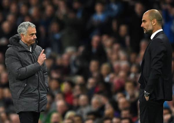 Jose Mourinho, left, will bid to delay Pep Guardiola's title party when they meet in the Manchester derby at the Etihad Stadium. Picture: Getty Images