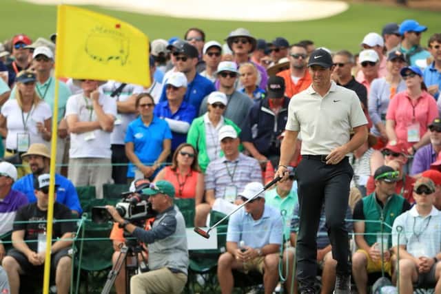 Rory McIlroy reacts to a putt on the 18th green during his round of 71. Picture: Getty Images