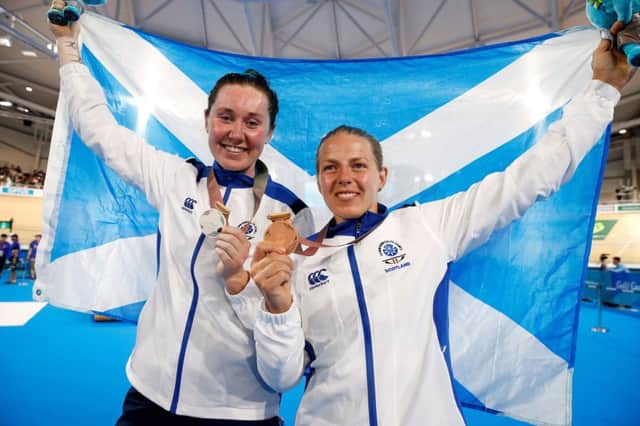 Scotland's Katie Archibald celebrates with her silver medal and Neah Evans her bronze. PICTURE: PA
