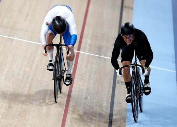 Scotland's Jack Carlin, left, loses the sprint final to Sam Webster of New Zealand. PICTURE: PA