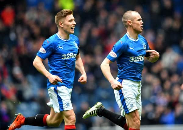 Kenny Miller celebrates his opener with Greg Docherty. Picture: SNS/Bill Murray