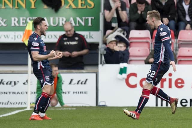 Ross County's Billy McKay celebrates his goal with Alex Schalk. Picture: SNS/Ross Parker
